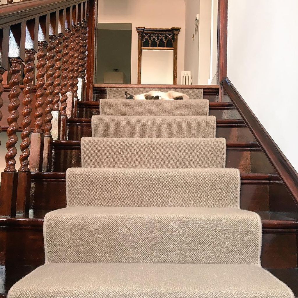 staircase with mahogany banister