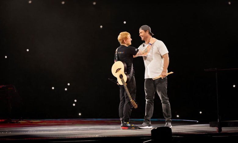 Chris Hemsworth joins Ed Sheeran on stage in Romania