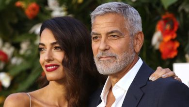 Amal Clooney is a vision in figure-skimming silk bridal dress alongside husband George