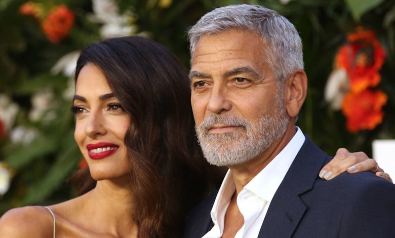 Amal Clooney is a vision in figure-skimming silk bridal dress alongside husband George