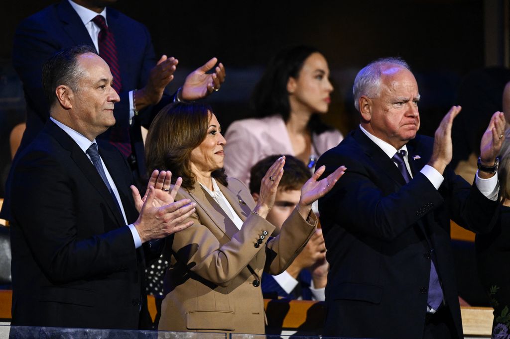 (L-R) US Second Gentleman Doug Emhoff, Vice President and 2024 Democratic presidential candidate Kamala Harris and Minnesota Governor and Democratic vice presidential candidate Tim Walz 