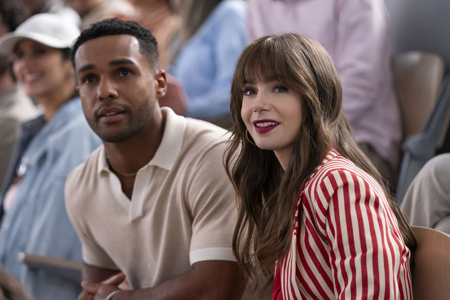 Emily in Paris. (L to R) Lucien Laviscount as Alfie, Lily Collins as Emily in Emily in Paris