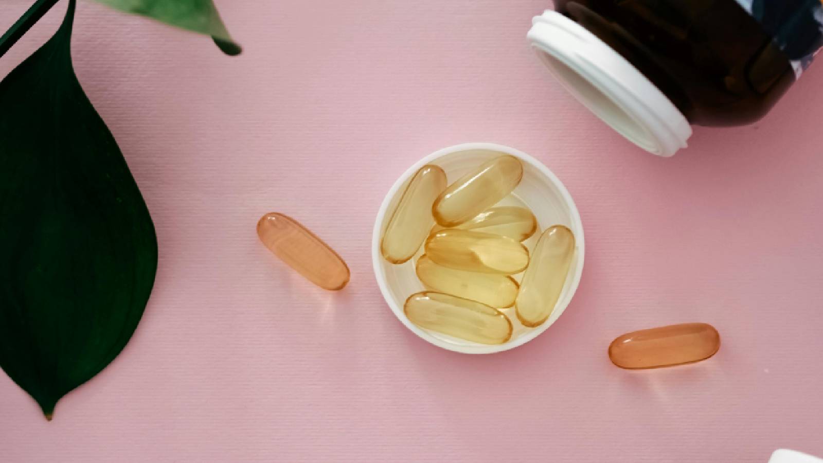 A bowl of cod liver oil capsules