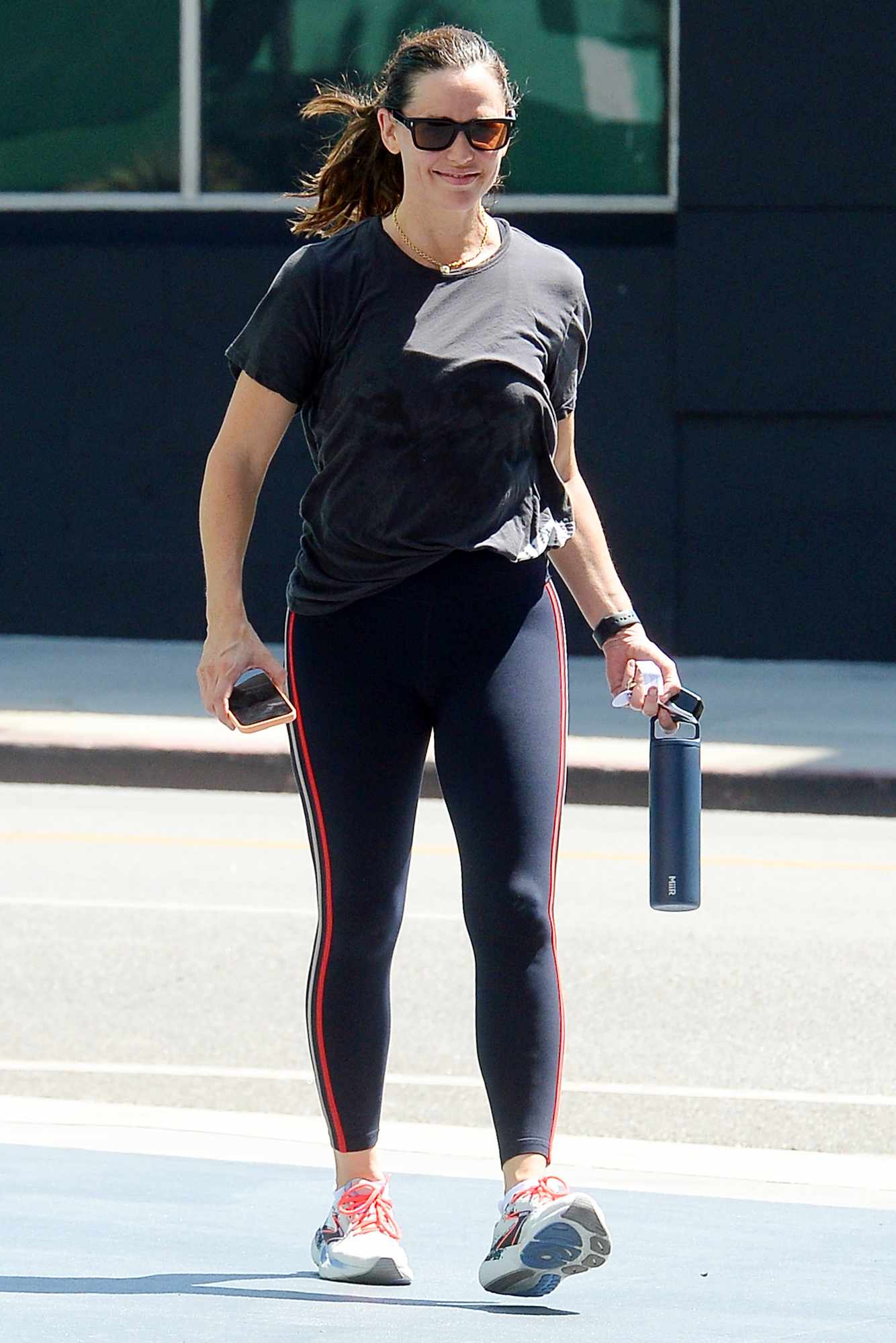 Jennifer Garner is spotted after a workout in Los Angeles. The 52 year old American actress wore a black tee shirt paired with black tights and trainers. The spotted has come after it has been reported the Garner is on a Break with her long time boyfriend John Miller 