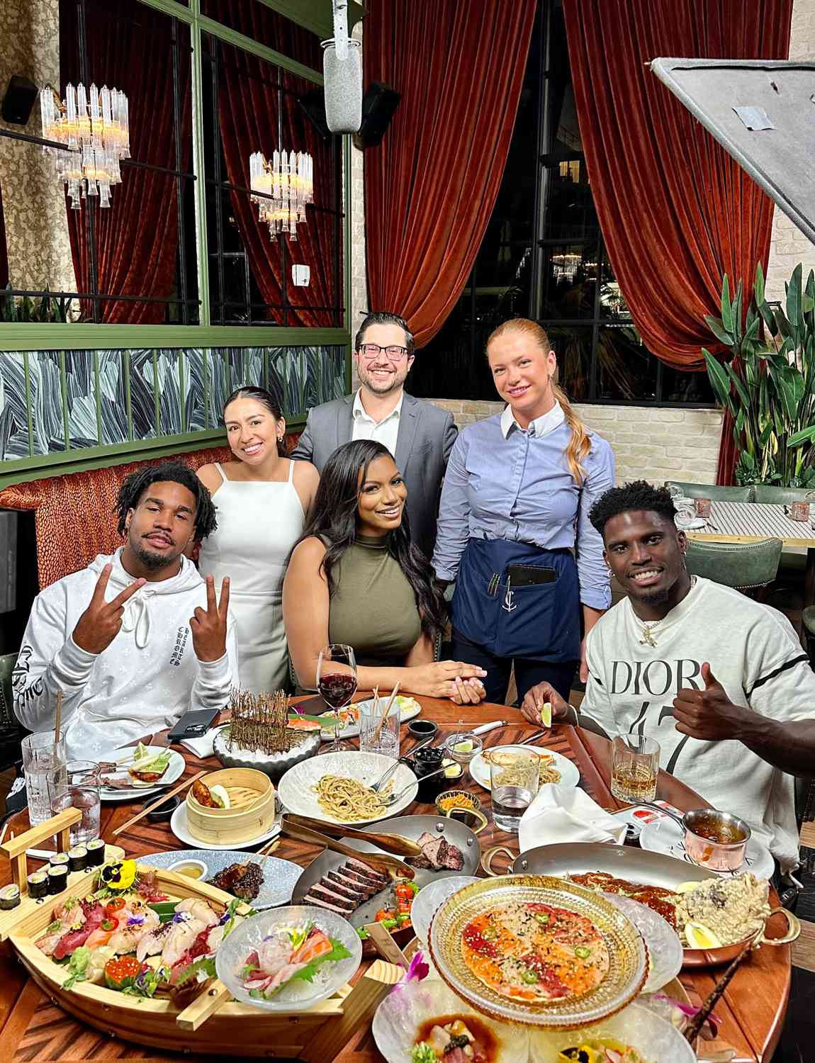 Miami Dolphin stars Tyreek Hill and Jaylen Waddle were seen enjoying dinner at Catch Miami Beach on Monday, August 26th. 