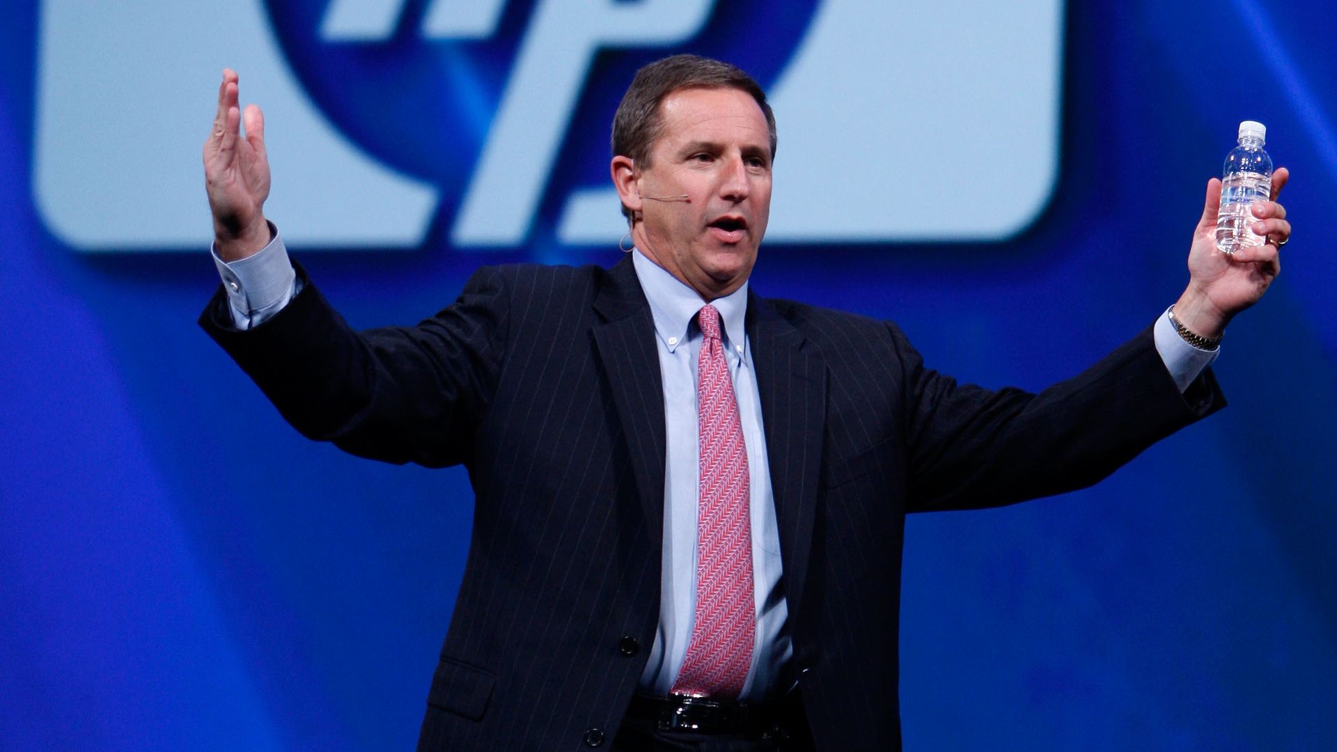 Mark Hurd stood talking on stage