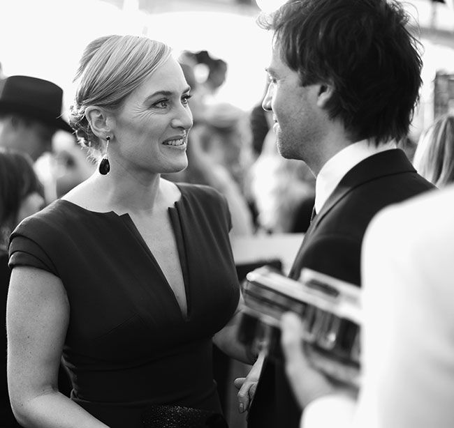 Black and white photo of Kate and Edward together on a red carpet