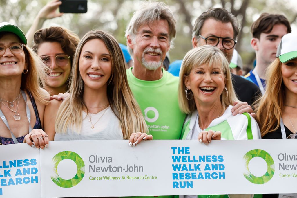 Chloe Lattanzi, John Easterling and  attends the Olivia Newton-John Wellness Walk and Research Run on October 06, 2019 in Melbourne, Australia