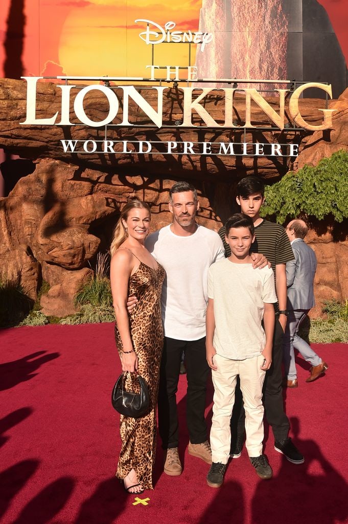 leann rimes with eddie cibrian and stepsons on disney red carpet