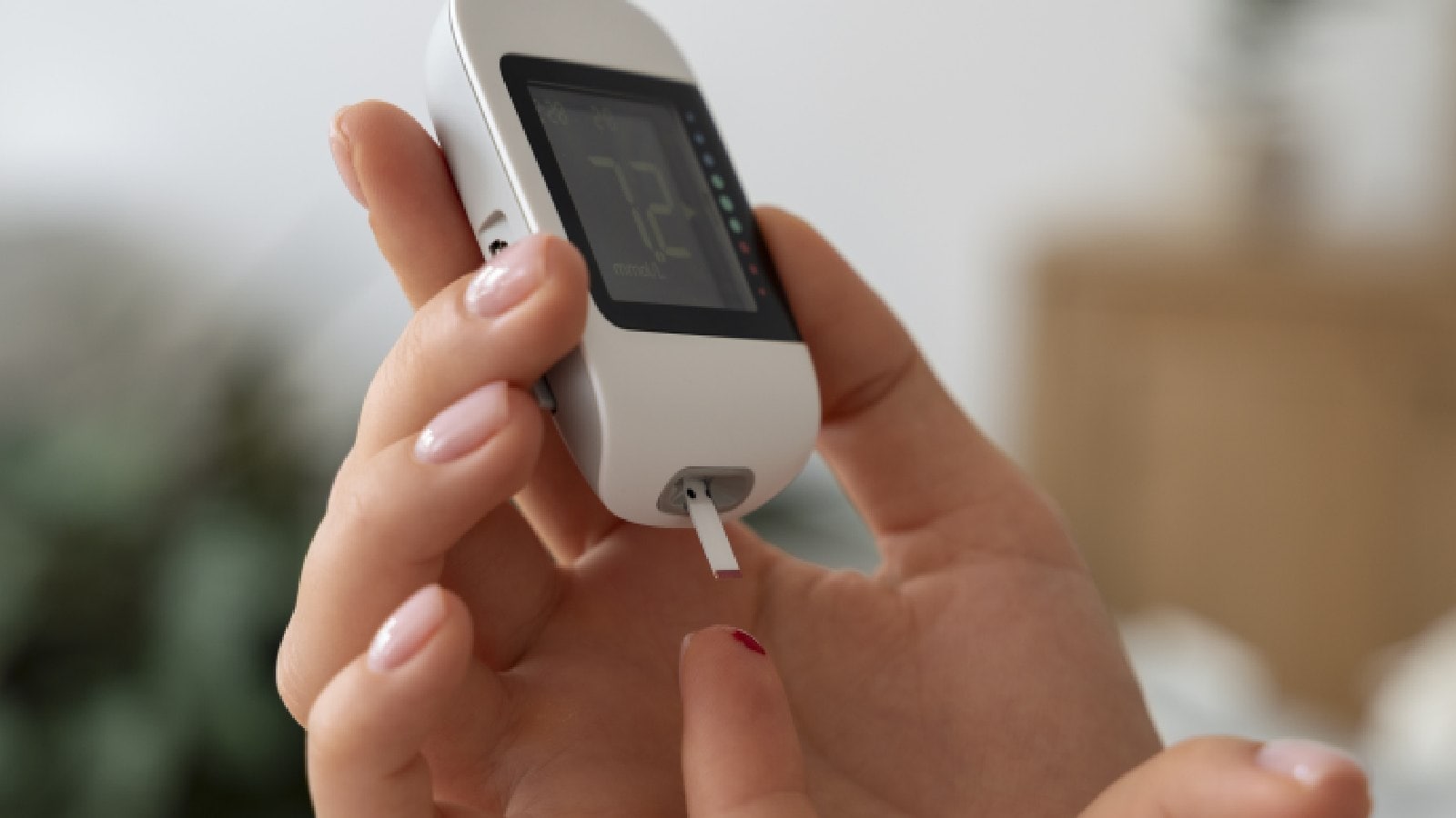 A woman checking blood sugar