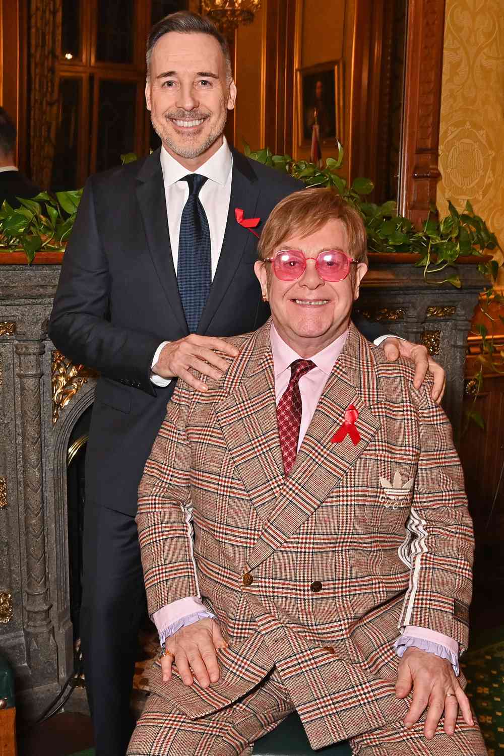 David Furnish and Sir Elton John attend a reception honouring Sir Elton John hosted by the All Party Parliamentary Group on HIV/AIDS at Speakers House in recognition of his enduring commitment to ending the AIDS epidemic, both personally and through the work of the Elton John AIDS Foundation, on November 29, 2023