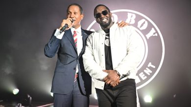 Shyne and Diddy are pictured on stage at London