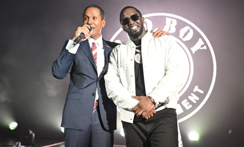 Shyne and Diddy are pictured on stage at London