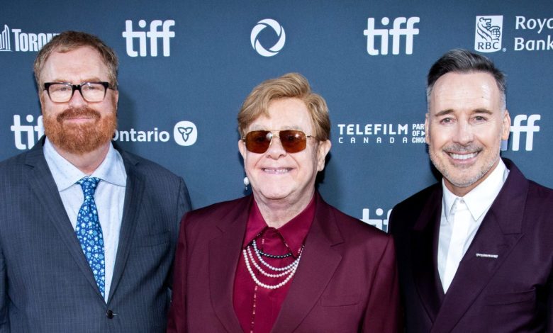 R.J. Cutler, Elton John and David Furnish attend the premiere of