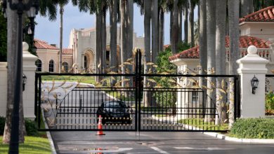 Law enforcement secures the area around Trump International Golf Club after the apparent assassination attempt on former president Donald Trump on Sept. 15.