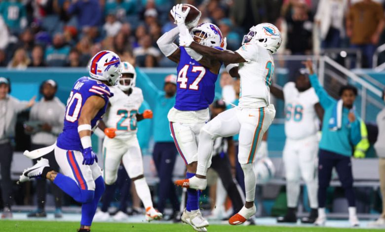 MIAMI GARDENS, FLORIDA - JANUARY 07: Christian Benford #47 of the Buffalo Bills intercepts a pass intended for Tyreek Hill #10 of the Miami Dolphins during the first quarter at Hard Rock Stadium on January 07, 2024 in Miami Gardens, Florida. (Photo by Megan Briggs/Getty Images)