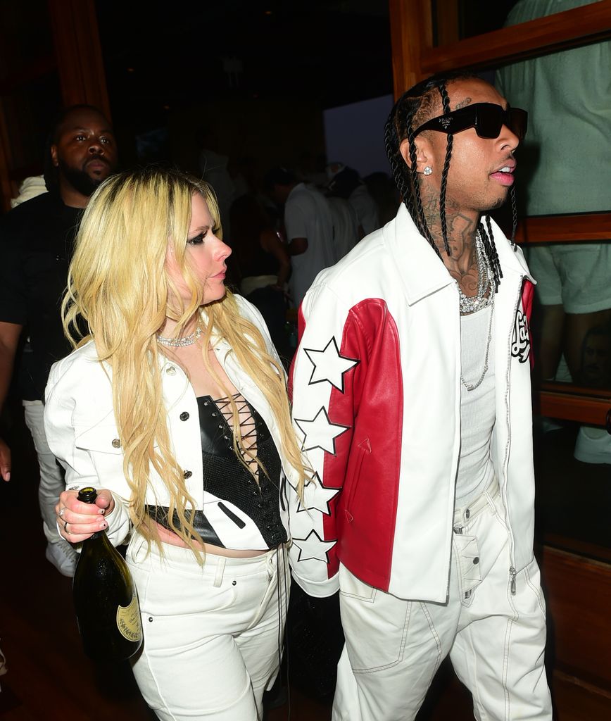 Avril Lavigne and Tyga attend Red White & Bootsy at Nobu Malibu on July 04, 2023 in Malibu, California.