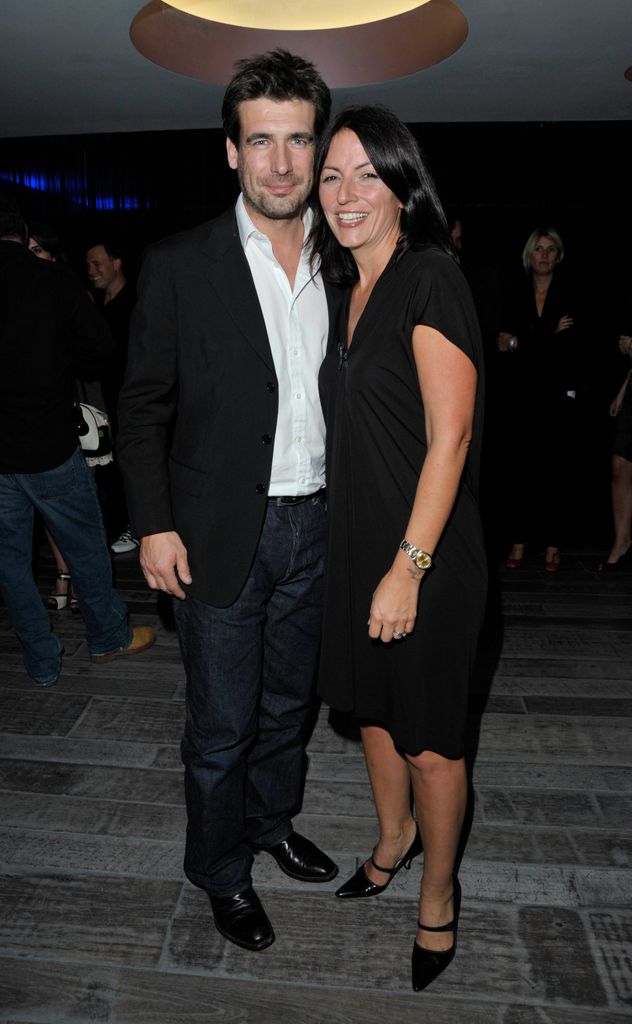 Davina McCall and former husband Matthew Robertson at awards smiling 