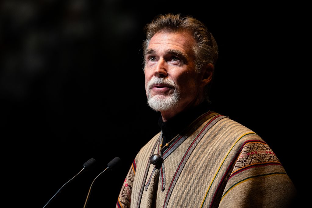 John Easterling delivers a tribute during the Memorial Service for Olivia Newton-John at Hamer Hall on February 26, 2023 in Melbourne, Australia