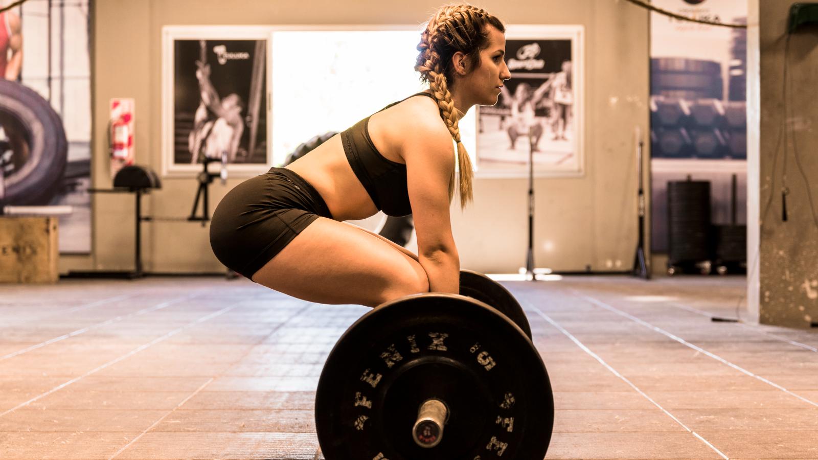 A woman doing deadlift for weight loss