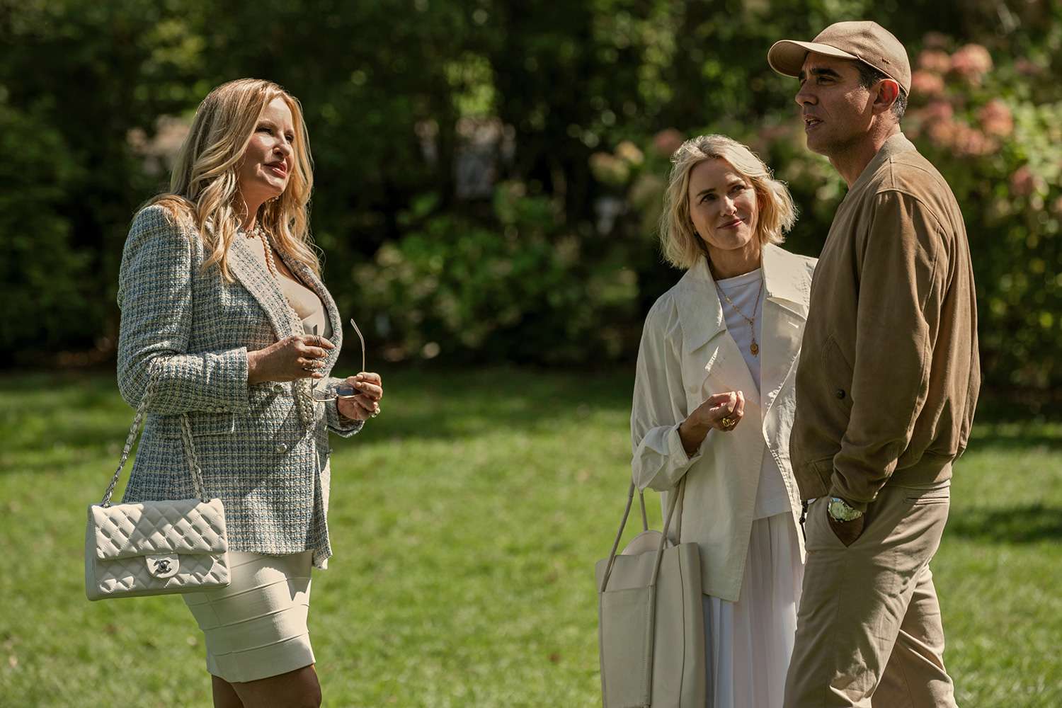 The Watcher. (L to R) Jennifer Coolidge as Karen Calhoun, Naomi Watts as Nora Brannock, Bobby Cannavale as Dean Brannock in episode 101 of The Watcher.