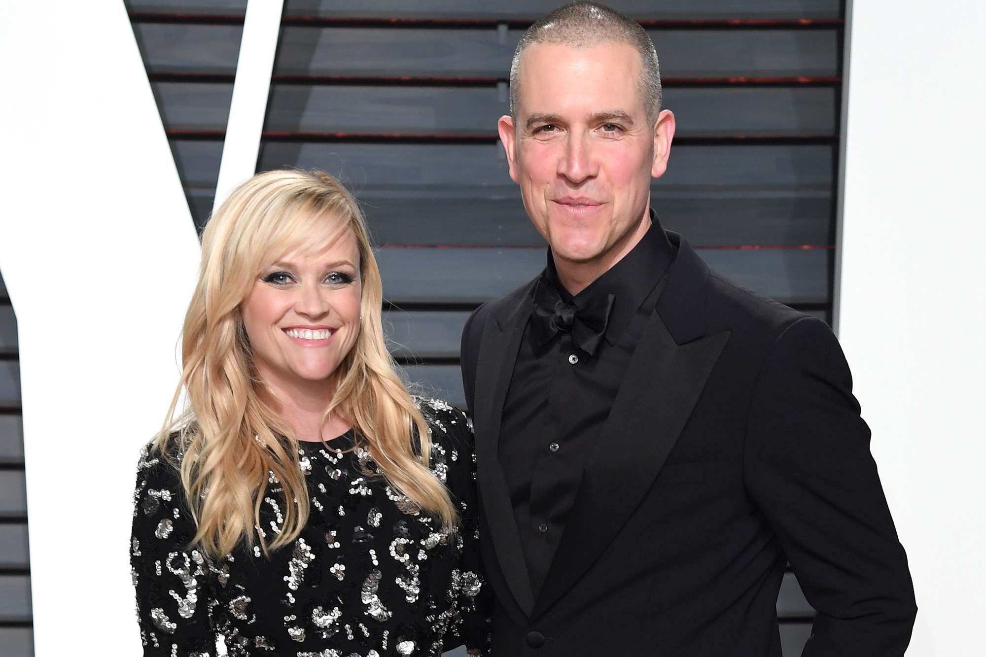 Reese Witherspoon and Jim Toth arrive for the Vanity Fair Oscar Party on February 26, 2017 in Beverly Hills, California.