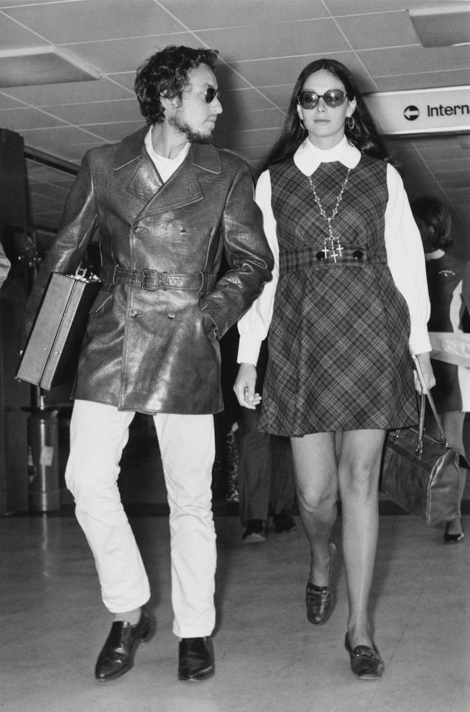 American singer-songwriter Bob Dylan with his wife, Sara Lownds at Heathrow Airport, London, 2nd September 1969