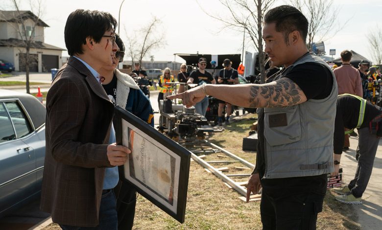 Front L to R: Ke Huy Quan (as Marvin Gable) and director Jonathan Eusebio on the set of Love Hurts