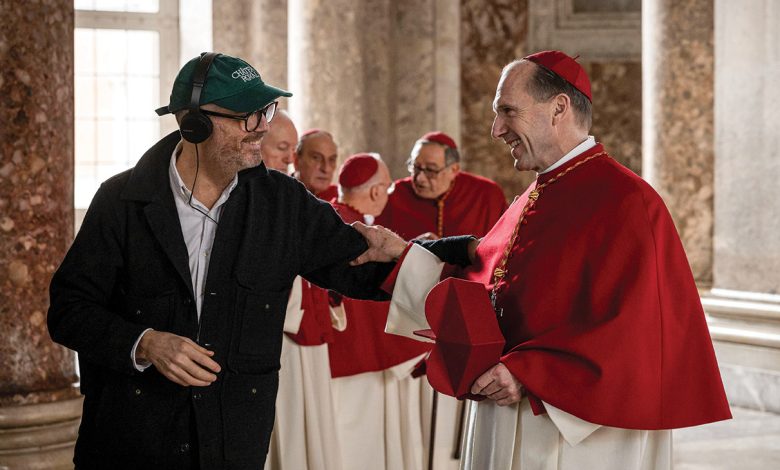 Edward Berger (left) and Ralph Fiennes on the set of Conclave. Edward is the Holy Grail of a director — someone who can do everything really, says screenwriter Peter Straughan.