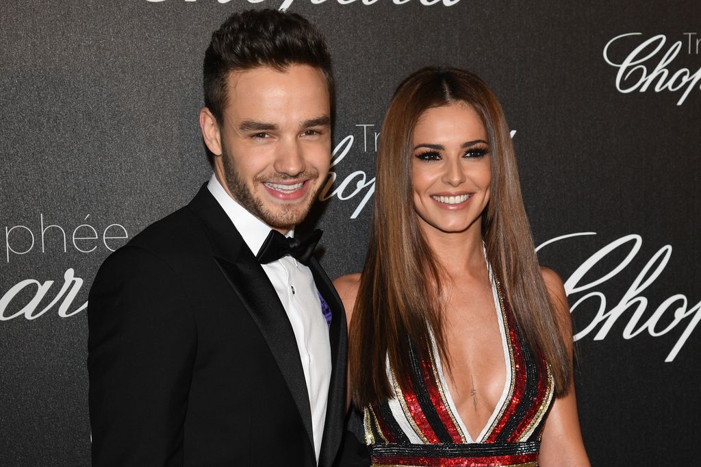 Liam Payne in a black tuxeod and Cheryl Cole in a sequin dress