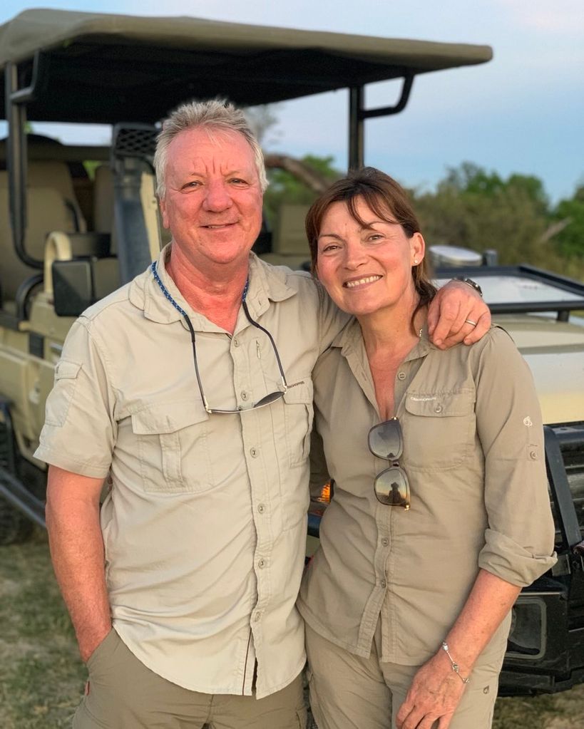 couple posing for photo on safari