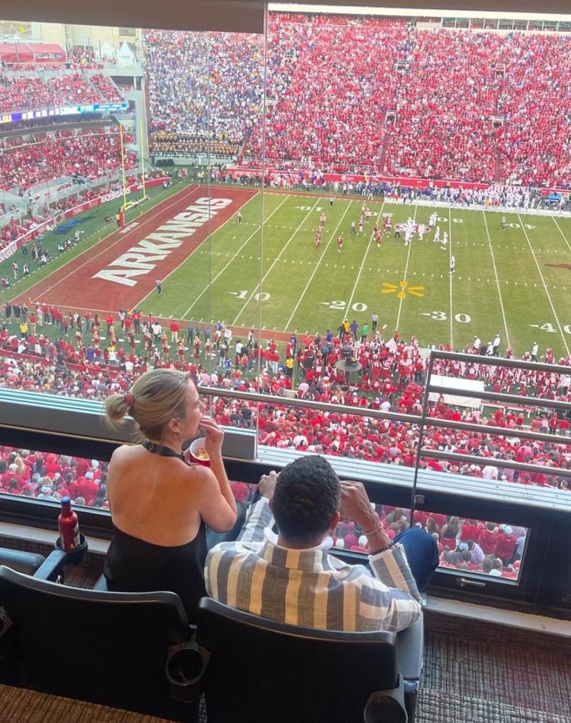 Photo shared by Amy Robach on Instagram October 2024 of her and T.J. enjoying a game in Fayetteville, Arkansas between the Arkansas Razorbacks and the Georgia Bulldogs