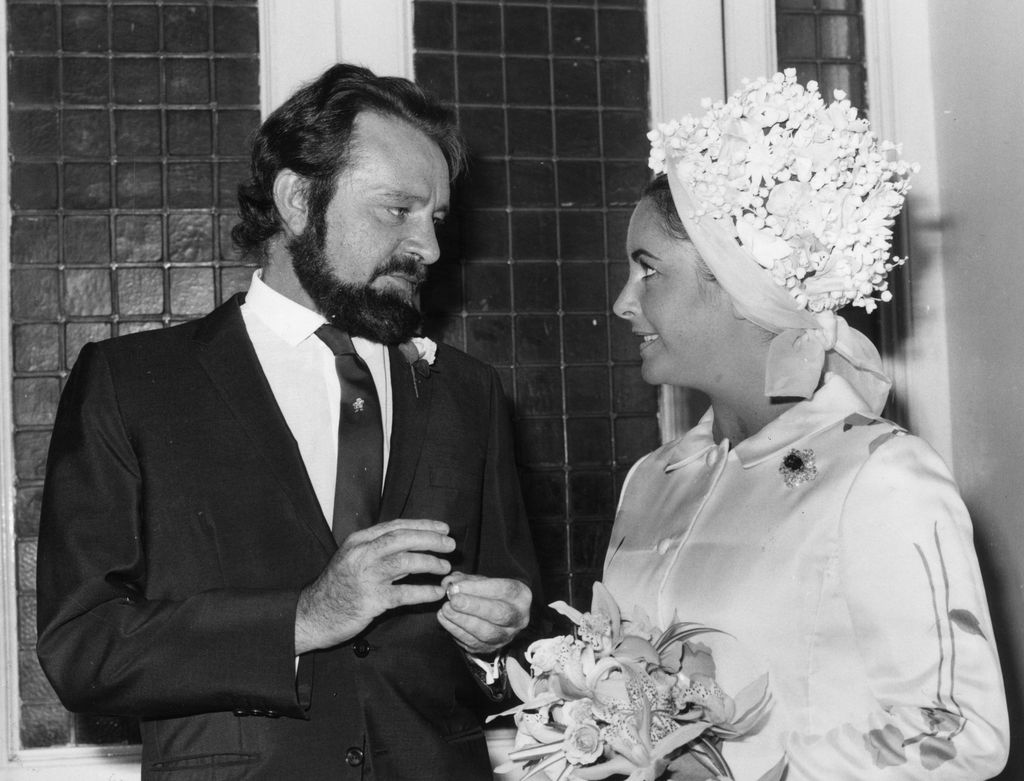 Richard Burton and Elizabeth Taylor in wedding outfits