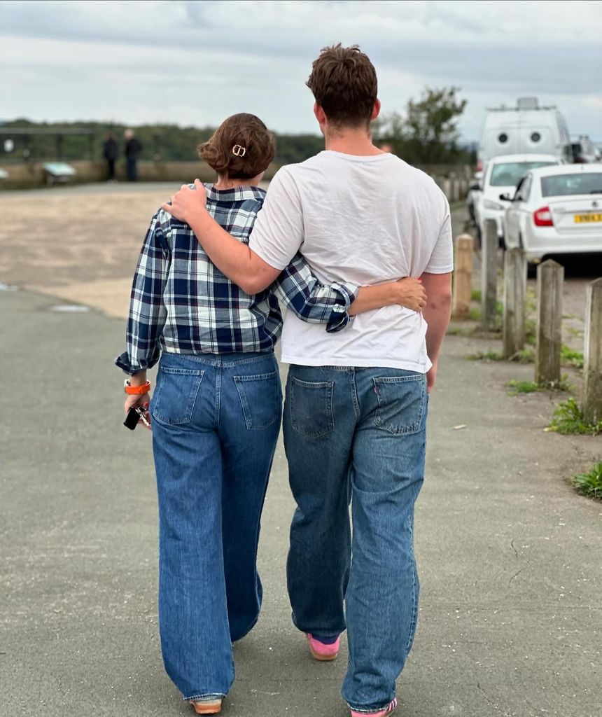 mother and son walking together