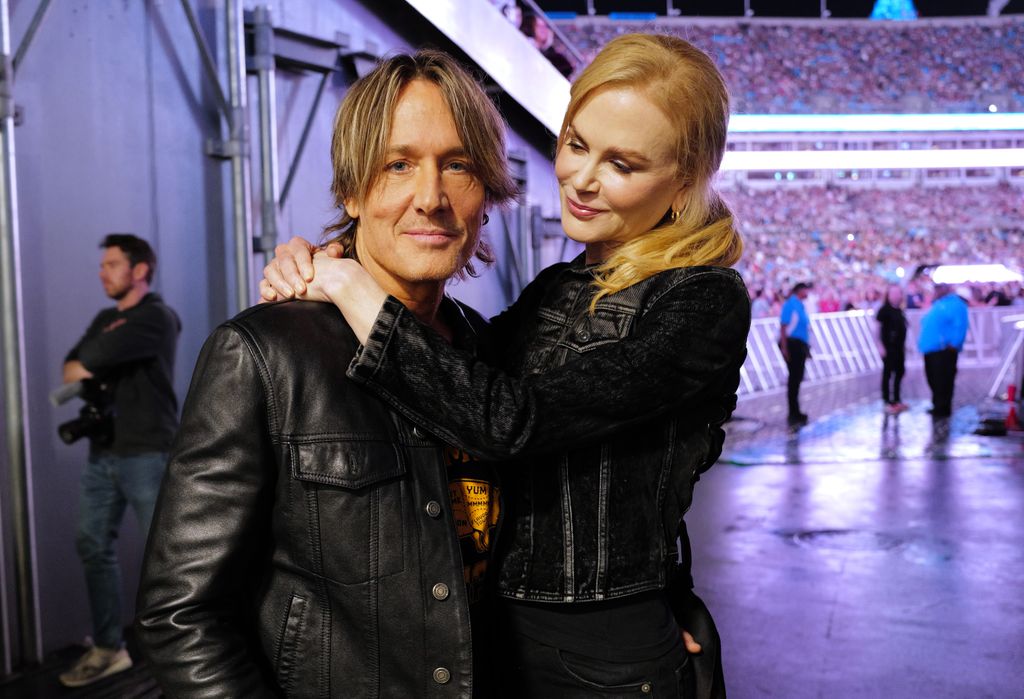 Keith Urban and Nicole Kidman are seen backstage at the Concert For Carolina Benefit Concert at Bank of America Stadium on October 26, 2024 in Charlotte, North Carolina