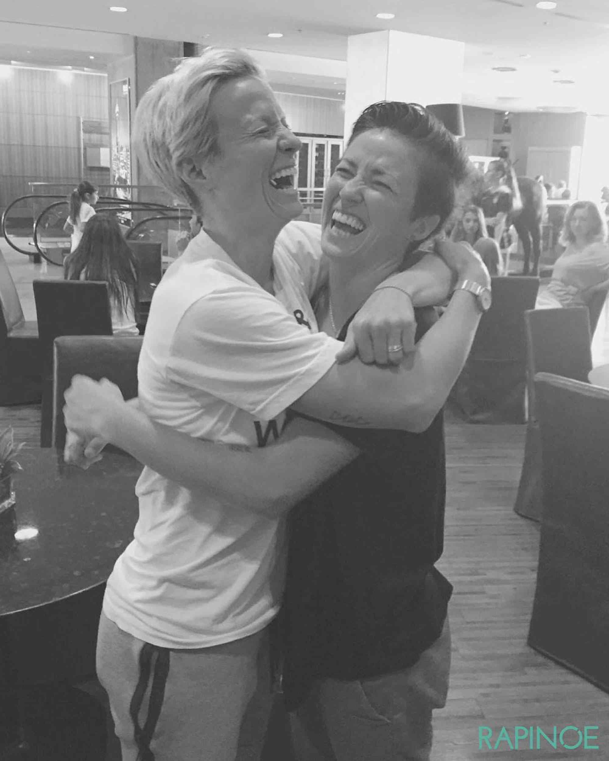 Rachael Rapinoe hugging her twin sister Megan.