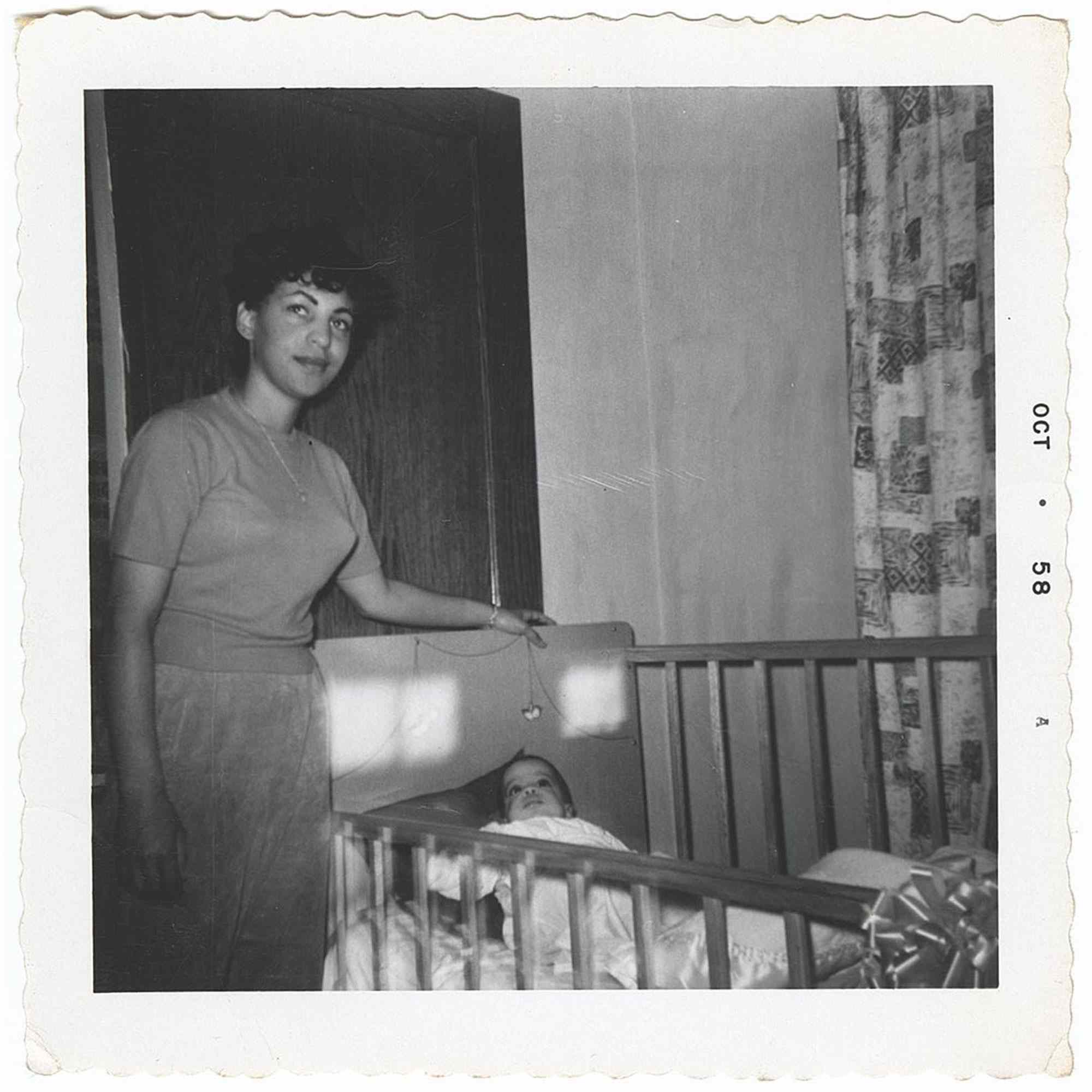 Prince's mother, Mattie Shaw, stands by Prince at his crib in October 1958, when he was four months old. Prince kept this photo in his vault. 