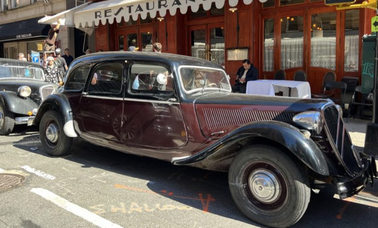 A Citroën Traction Avant parked on Lexington Ave, in front on the French bistro Orsay, on the New York set of Josh Safdie