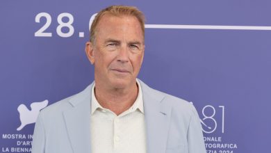 Kevin Costner attends the Venice Film Festival in a blue suit