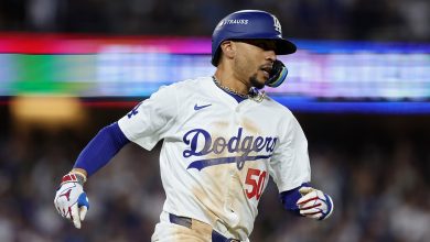 Mookie Betts 50 of the Los Angeles Dodgers reacts after hitting a double during the 8th inning of Game Six of the National League Championship Series against the New York Mets at Dodger Stadium on October 20, 2024 in Los Angeles, California.