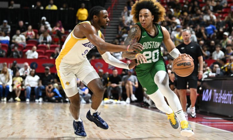 LAS VEGAS, NEVADA - JULY 15: JD Davison #20 of the Boston Celtics drives past Bronny James Jr. #9 of the Los Angeles Lakers in the first half of a NBA Summer League game at the Thomas & Mack Center on July 15, 2024 in Las Vegas, Nevada. NOTE TO USER: User expressly acknowledges and agrees that, by downloading and or using this photograph, User is consenting to the terms and conditions of the Getty Images License Agreement. (Photo by Candice Ward/Getty Images)