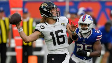 LONDON, ENGLAND - OCTOBER 8: Trevor Lawrence of Jacksonville Jaguars controls the ball during the NFL match between Jacksonville Jaguars and Buffalo Bills at Tottenham Hotspur Stadium on October 8, 2023 in London, England. (Photo by Vincent Mignott/DeFodi Images via Getty Images)