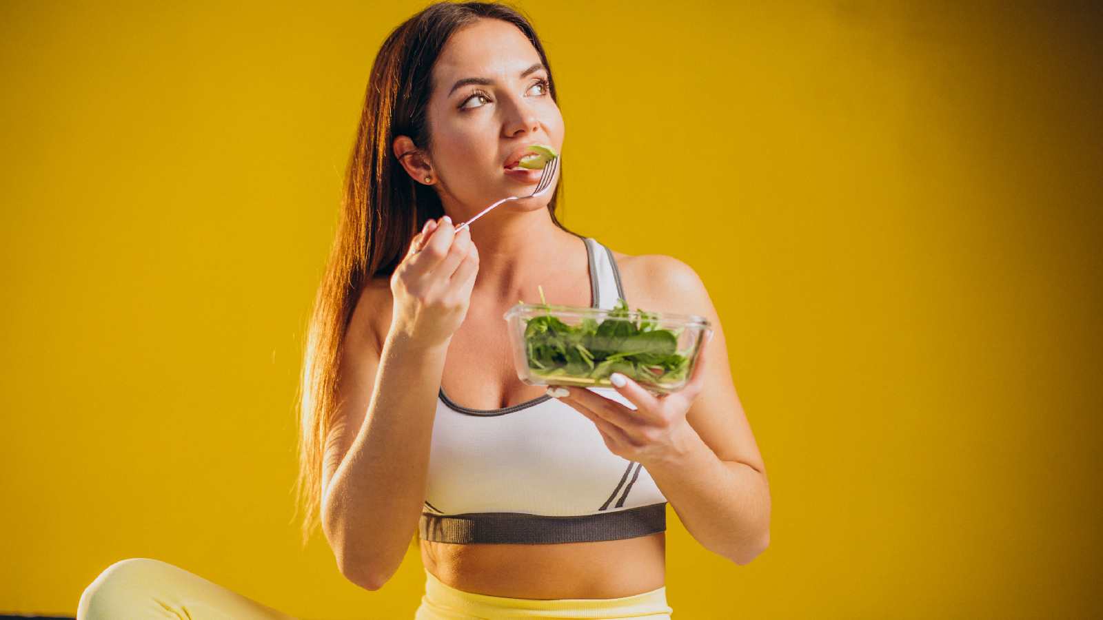 A woman eating slowly