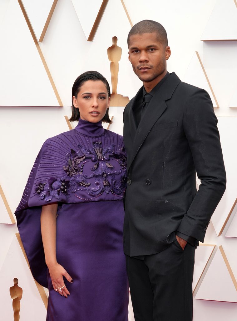 Naomi Scott and Jordan Spence attend the 94th Annual Academy Awards at Hollywood and Highland on March 27, 2022 in Hollywood, California.