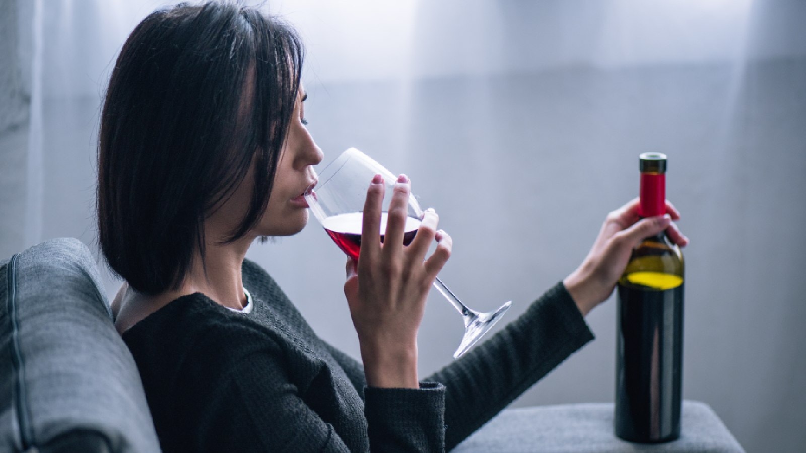 woman drinking alcohol