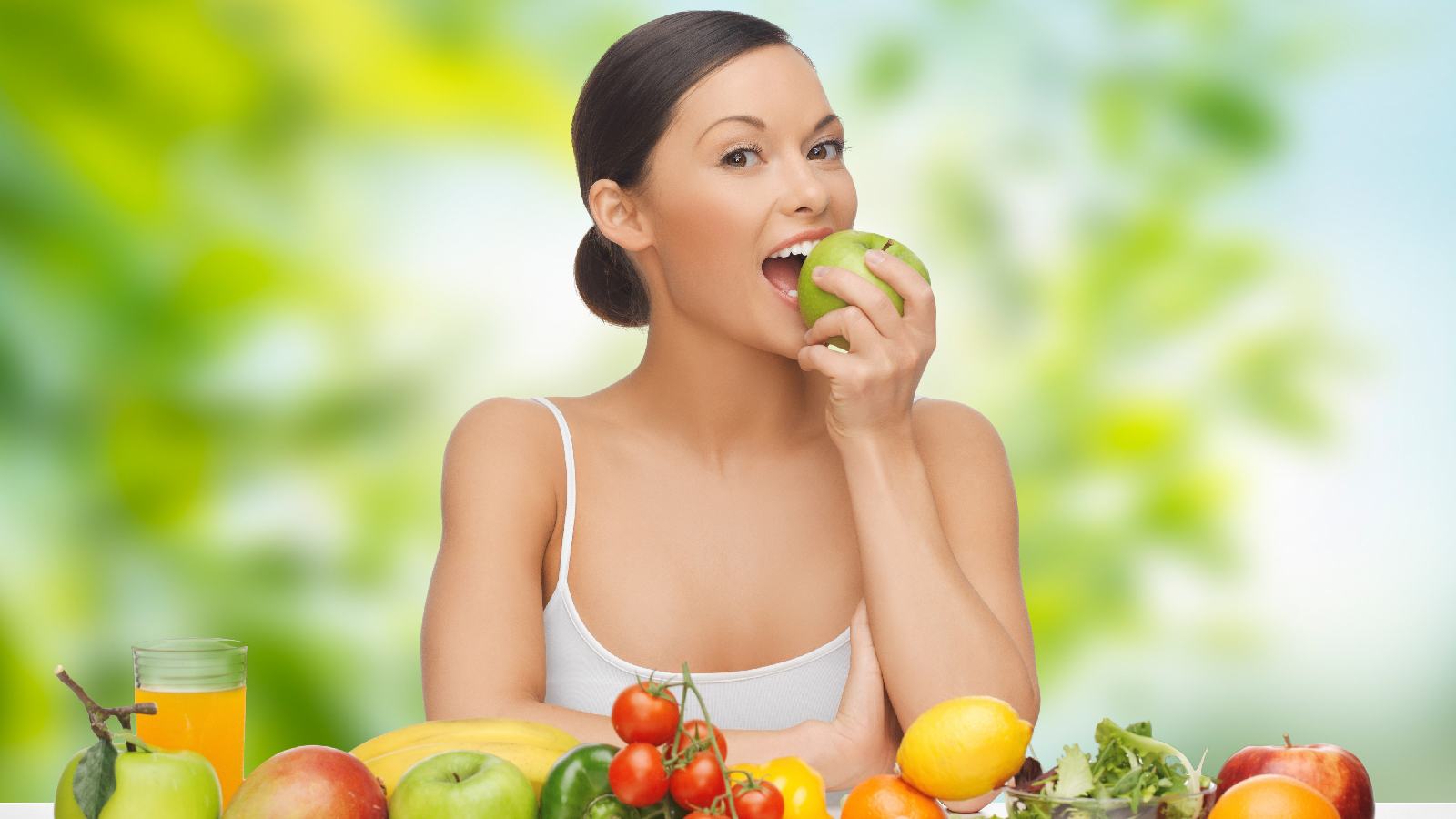 A woman eating healthy foods