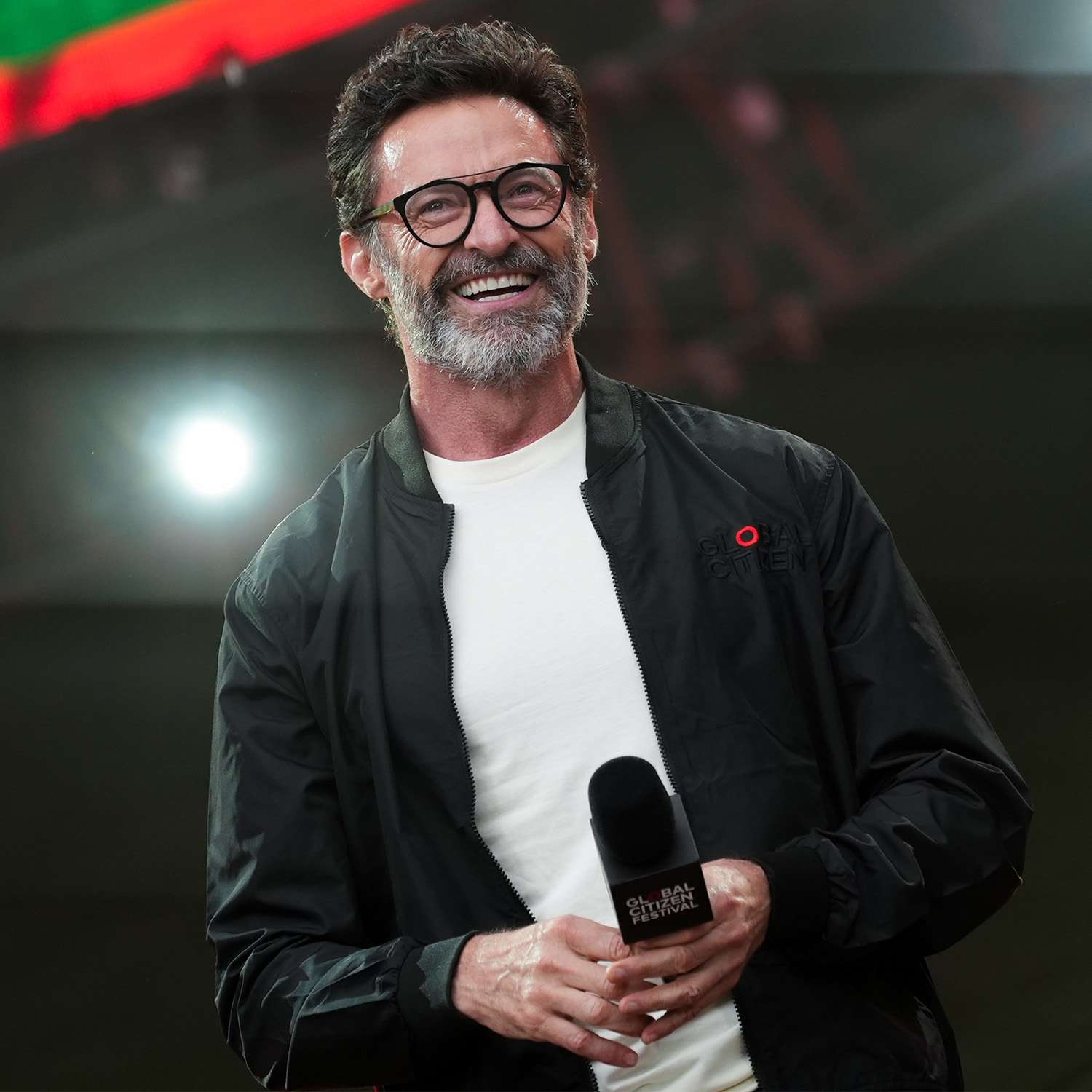 Hugh Jackman and Jordan Fisher speak onstage at the 2024 Global Citizen Festival: New York held at Central Park