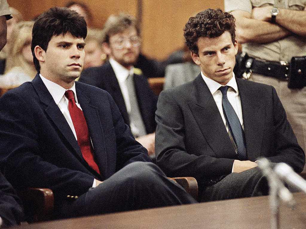 Lyle, left, and Erik Menendez sit in Beverly Hills Municipal Court where their attorneys delayed making pleas on behalf of the brothers who are suspected in the murders of their millionaire parents, Jose and Mary Louise Menendez, March 12, 1990.