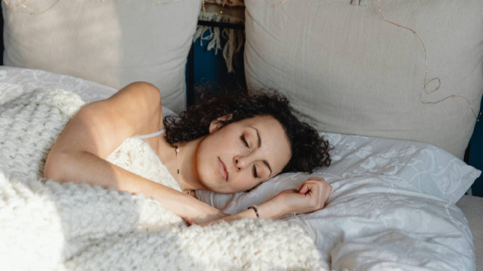 A woman sleeping on left side