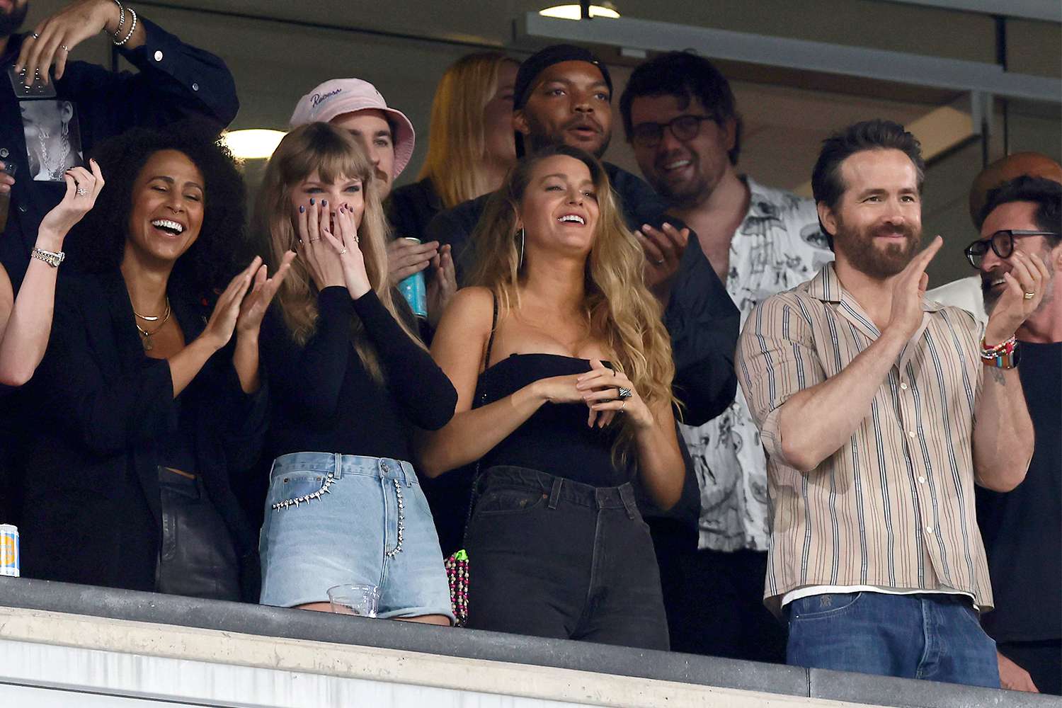 Singer Taylor Swift (C), actress Blake Lively (2nd R) and actor Ryan Reynolds (R) attend a game between the New York Jets and the Kansas City Chiefs at MetLife Stadium on October 01, 2023 in East Rutherford, New Jersey. The Chiefs defeated the Jets 23-20